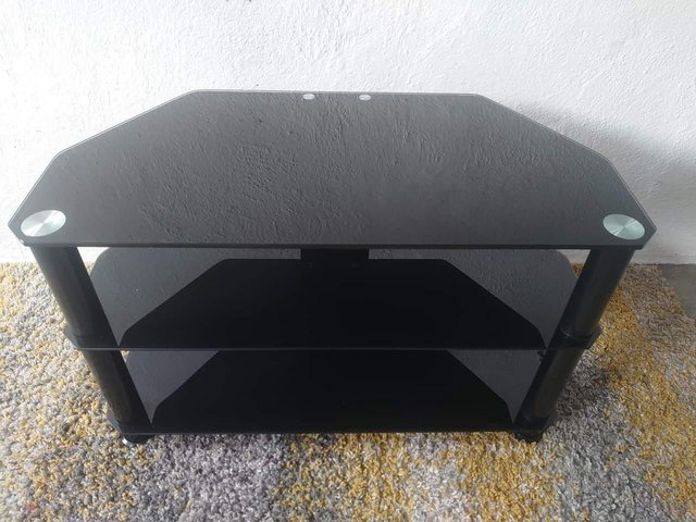 Preview of the first image of Black toughened glass TV stand.