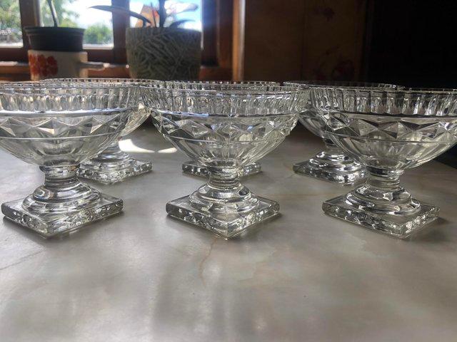 Preview of the first image of Art Deco style moulded glass sundae dishes.