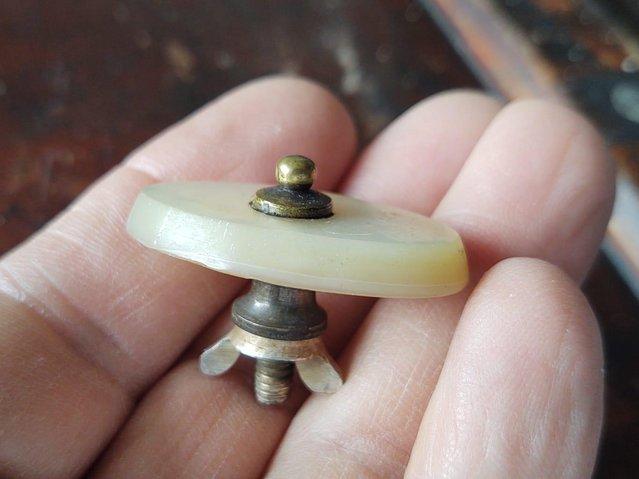 Preview of the first image of A Miniature Antique Draw/Cabinet Handle.