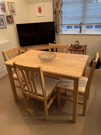 Image 1 of Dining table and four chairs