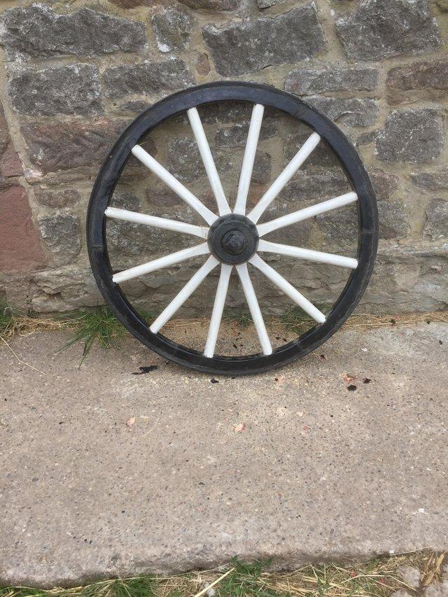 Preview of the first image of Antique original cart wheel excellent condition.
