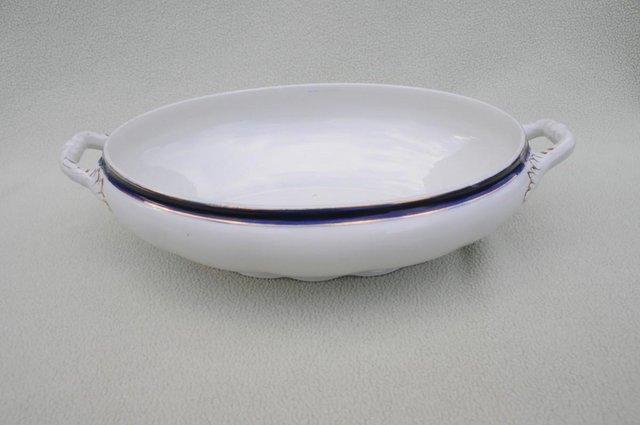 Preview of the first image of Victorian Pottery Serving Dish White With Blue Line.