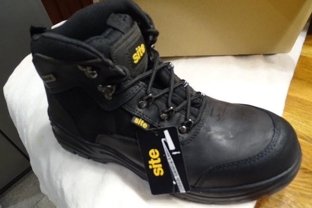 Preview of the first image of Site boots size 10, new in the box.