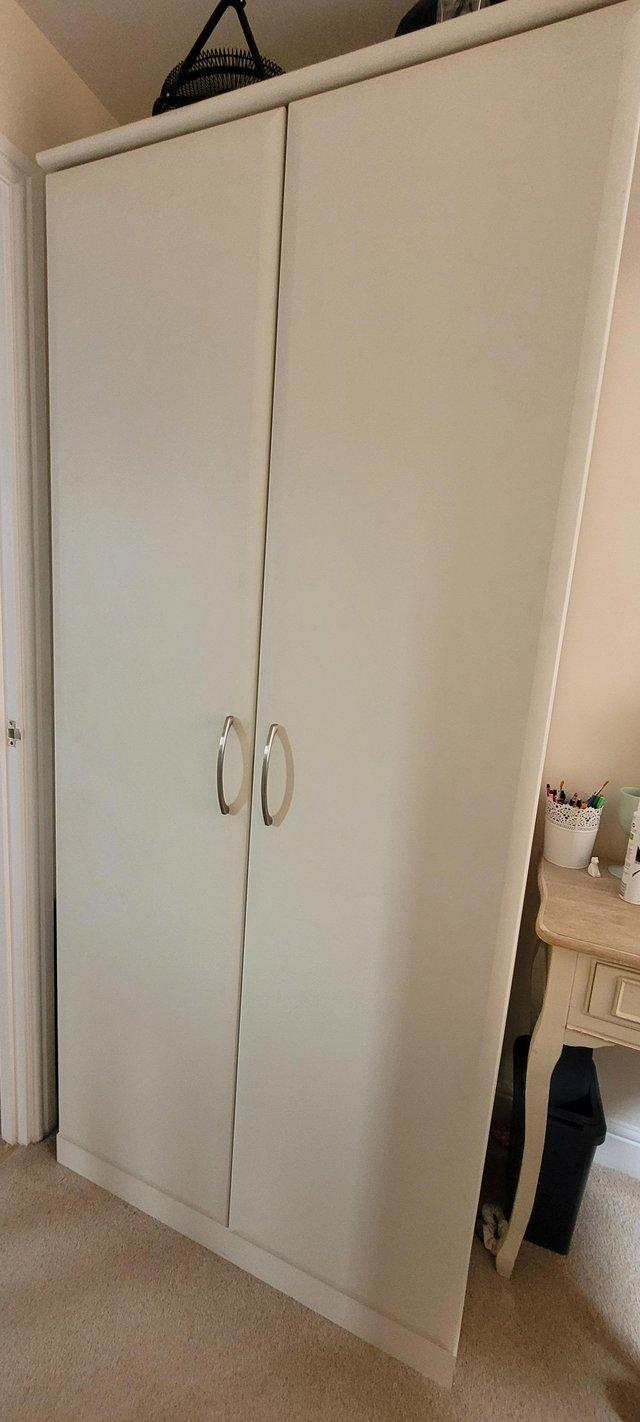 Preview of the first image of Single cream coloured wardrobe.