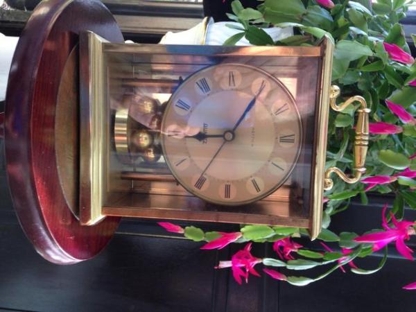 Image 3 of CLOCKS.as shown. .working order.. downsizing.
