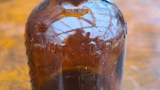 Image 4 of Antique 1920s embossed Lysol bottle amber glass