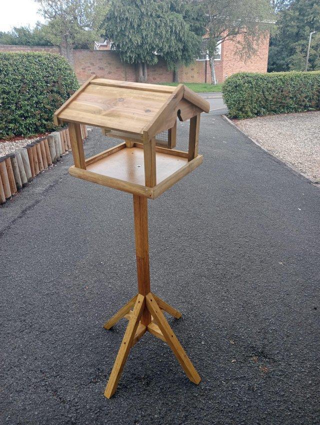 Preview of the first image of Bird tables 4 feet high New stained ready to go.