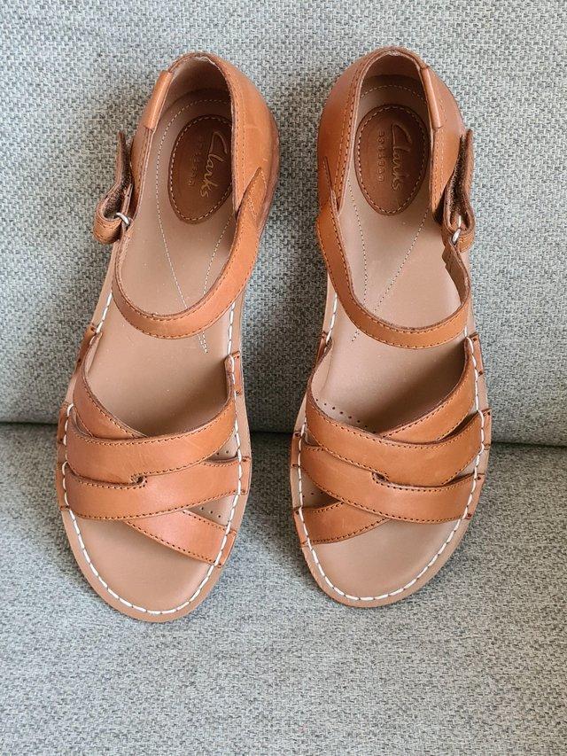 Preview of the first image of Brans new Clarks Leather Tan Sandals.