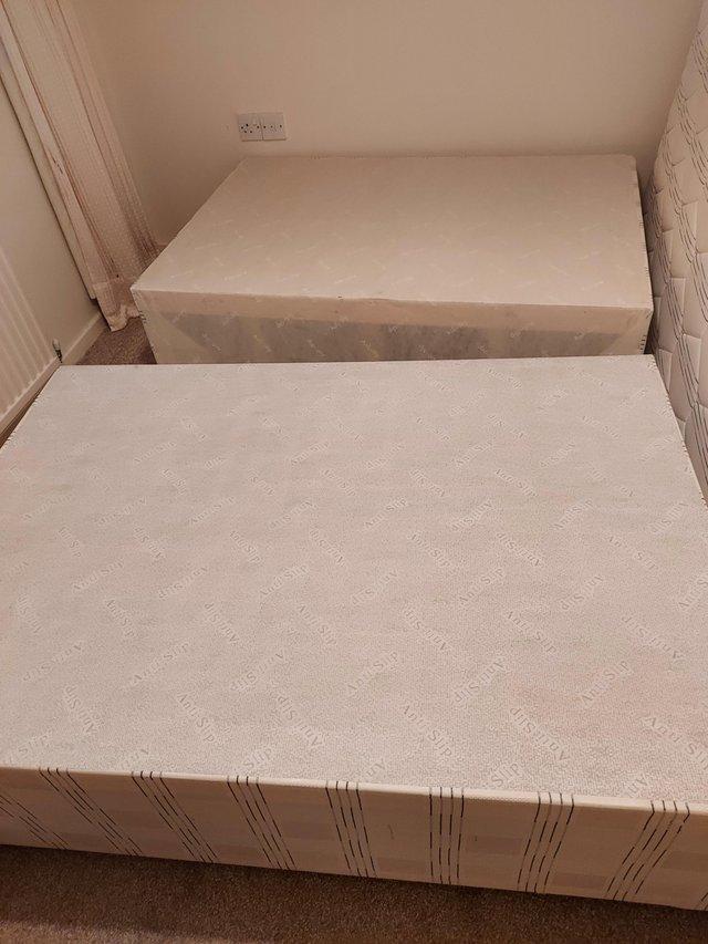 Preview of the first image of Brand new double mattress and double divan with under drawer.