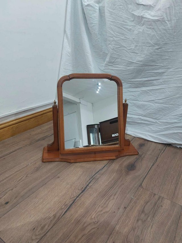 Preview of the first image of Wooden frame tabletop mirror..