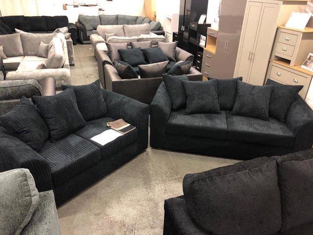 Preview of the first image of Byron 3&2 sofas in all black jumbo cord.
