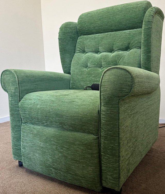 Preview of the first image of LUXURY ELECTRIC RISER RECLINER GREEN CHAIR ~ CAN DELIVER.