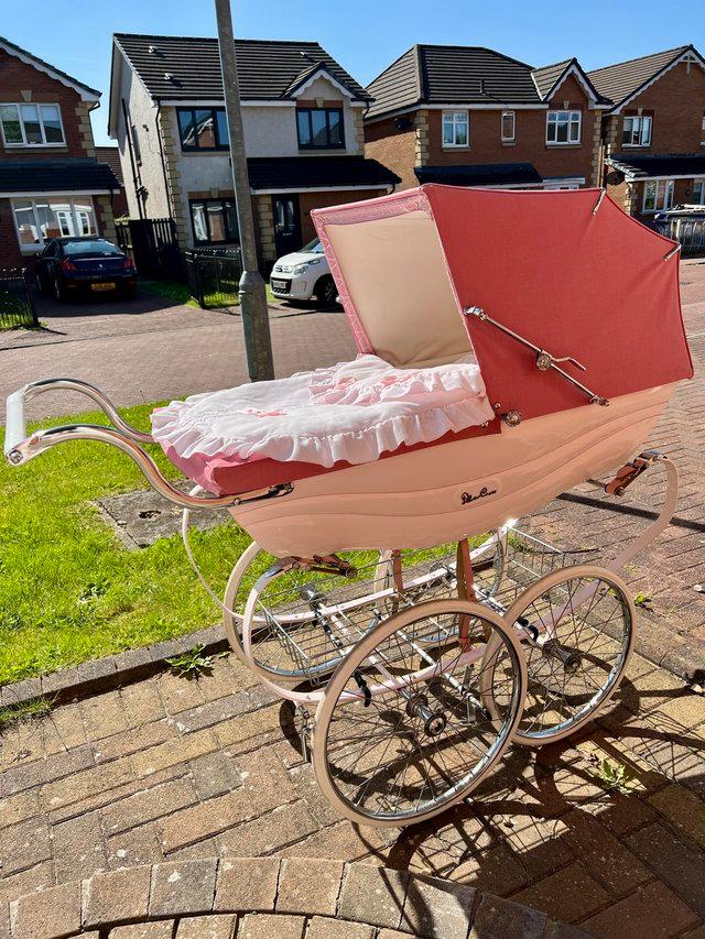 Preview of the first image of Pink Silver Cross Balmoral Coachbuilt Pram.