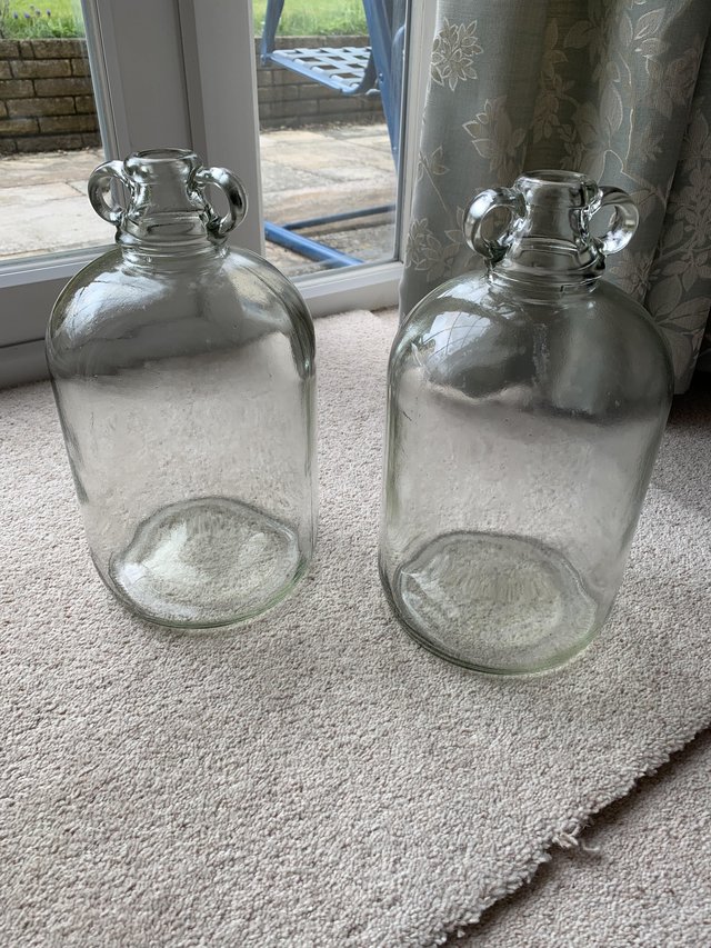 Preview of the first image of 7 x vintage gallon demijohns for wine making etc..