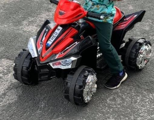 Preview of the first image of Kids quad bike battery powered red.