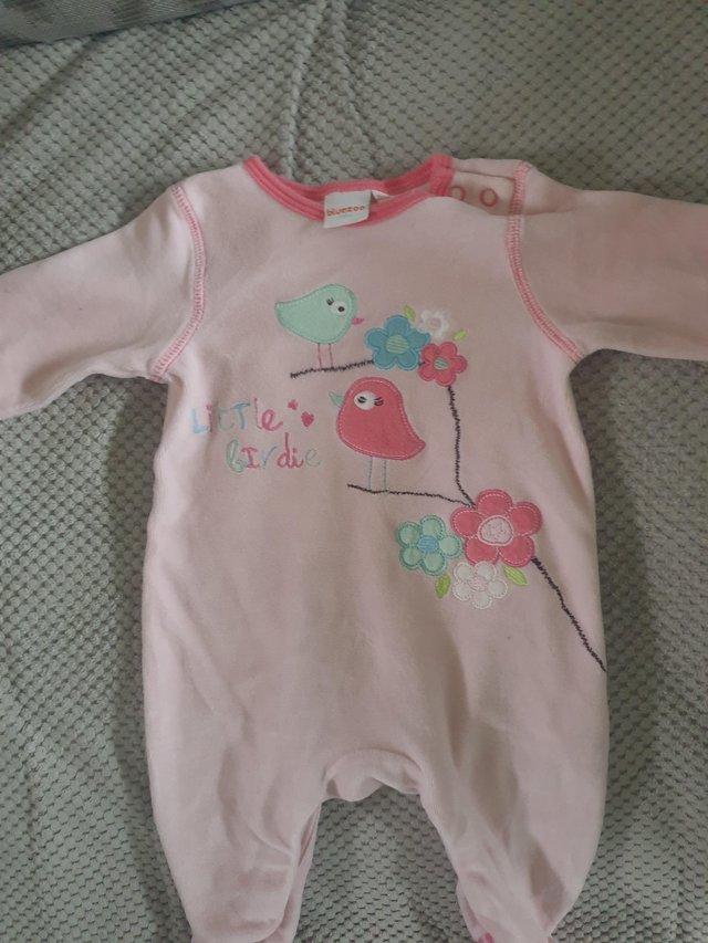 Preview of the first image of Blue zone baby girls romper 0-3 months.
