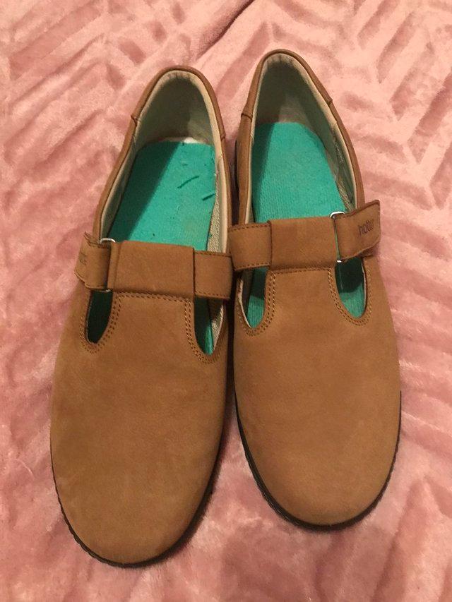 Preview of the first image of Hotter tan suede shoes worn once size 8.