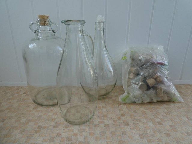 Preview of the first image of ++Demijohns and wine-making equipment.
