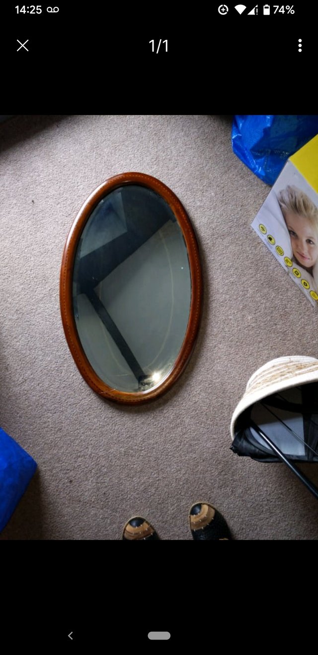 Preview of the first image of Beautiful antique mirror slight repair looks good ,heavy loo.