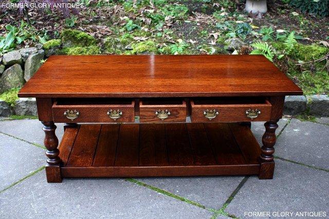 Image 63 of TAYLOR & Co STRESSED OAK THREE DRAWER POTBOARD COFFEE TABLE