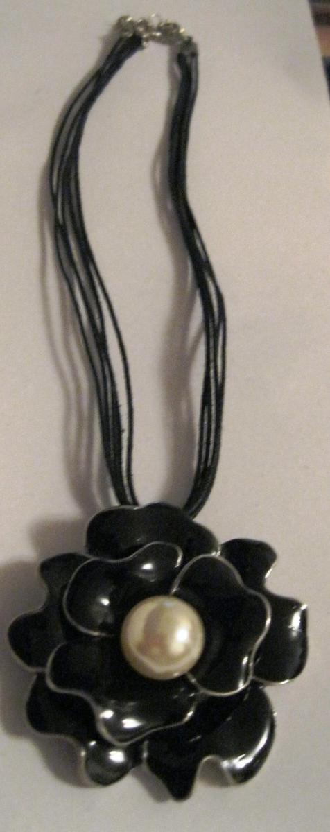 Preview of the first image of Black Floral pendant necklace with pearl like centre..