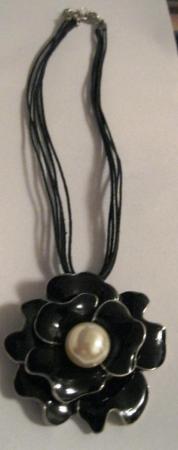 Image 1 of Black Floral pendant necklace with pearl like centre.
