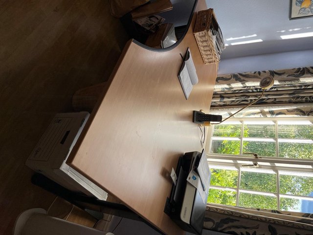 Preview of the first image of L-shaped desk in beech with black trim and fittings.