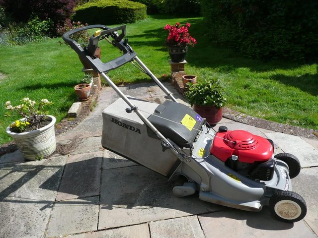 Preview of the first image of Honda 4stroke mower with driven rear roller.