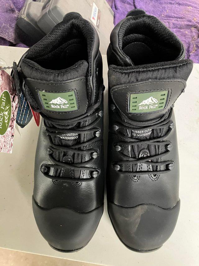 Preview of the first image of Size 11 Rock Fall safety boots, brand new.