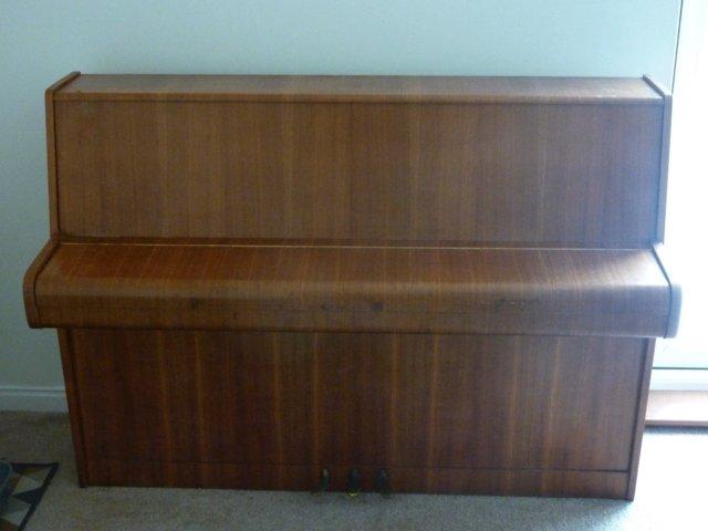 Preview of the first image of Calisia modern piano, in good condition. Bought from John Ro.
