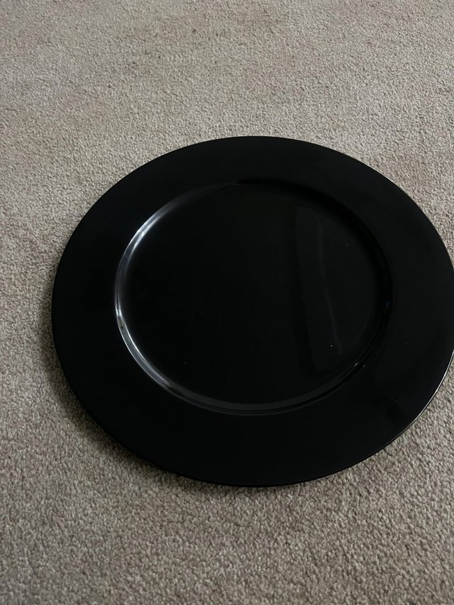 Preview of the first image of Black charger plates for weddings.