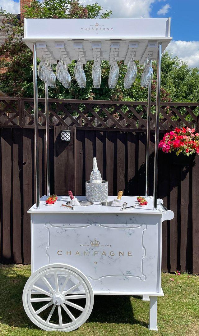 Preview of the first image of Gorgeous Champagne/ Prosecco Cart for hire.