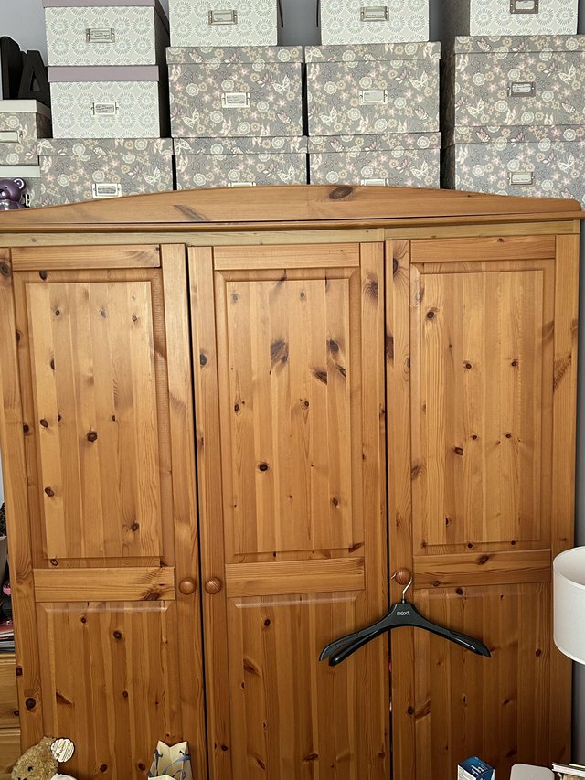 Preview of the first image of Three door wardrobe, pine effect.
