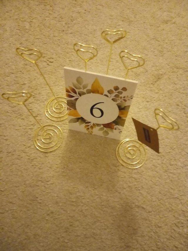Preview of the first image of Wedding Table number - card holder.