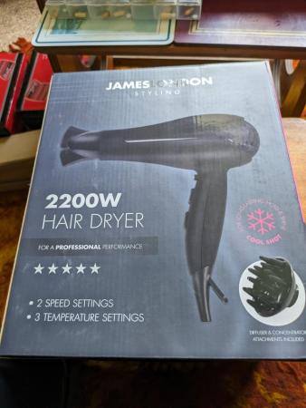 Image 1 of New still in box 2200 W hair dryer.