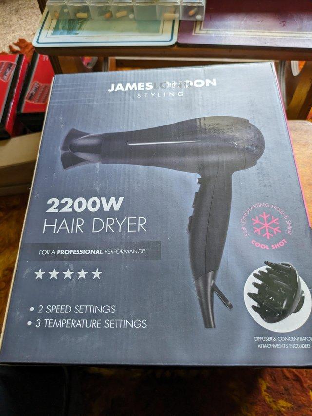 Preview of the first image of New still in box 2200 W hair dryer..