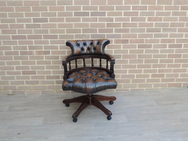 Preview of the first image of Golden Brown Chesterfield Captains Chair (UK Delivery).