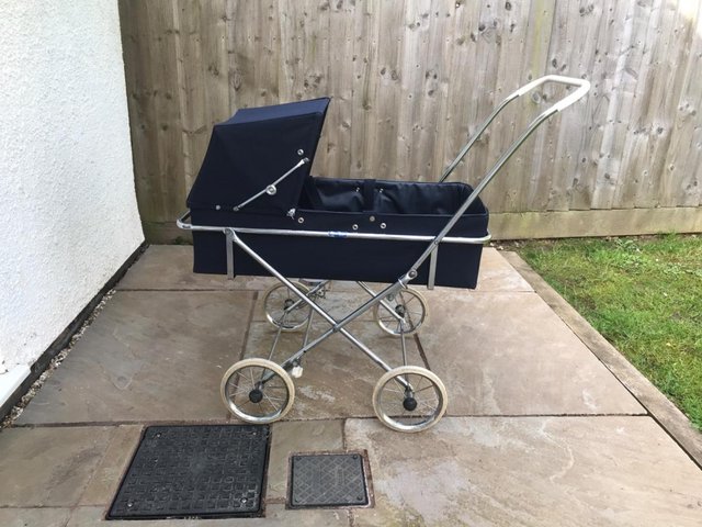 Preview of the first image of Vintage Silver Cross Carrycot and Transporter.