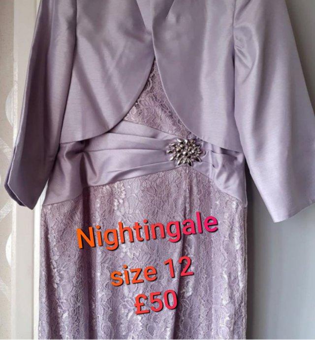 Preview of the first image of NIGHTINGALES lilac dress with matching jacket.