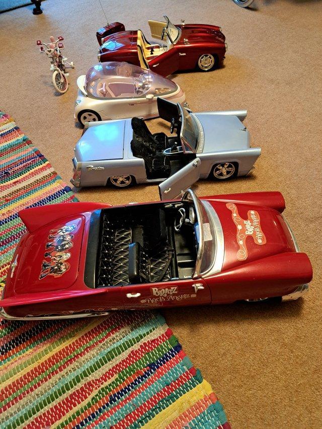 Bratz collectibles. Four cars and a tandam For Sale in Mablethorpe