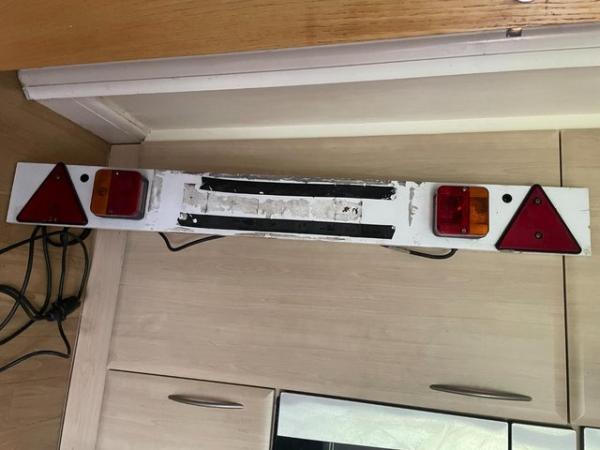 Image 1 of 4 foot trailer light board, all working good light covers
