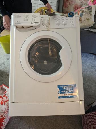 Image 1 of White washer dryer machine