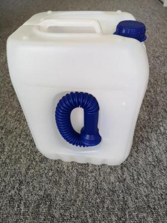 Image 1 of 10 litre plastic container with spout.