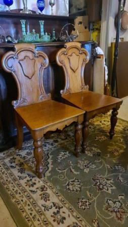 Image 1 of Pair of Antique Victorian Mahogany Wood Hall Chairs Armorial