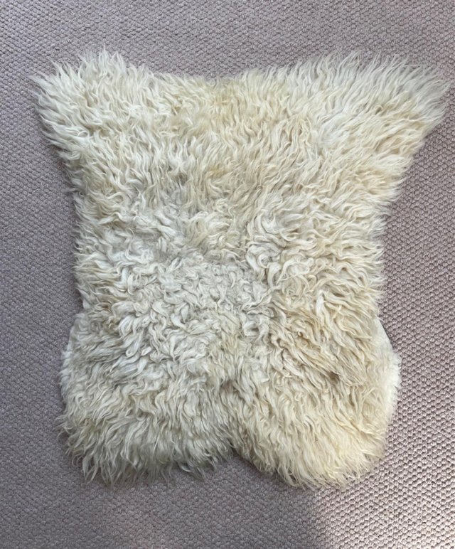 Preview of the first image of Genuine natural small sheepskin rug.