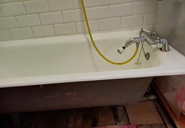 Preview of the first image of 1890's Victorian, Antique Cast Iron Bath Tub.