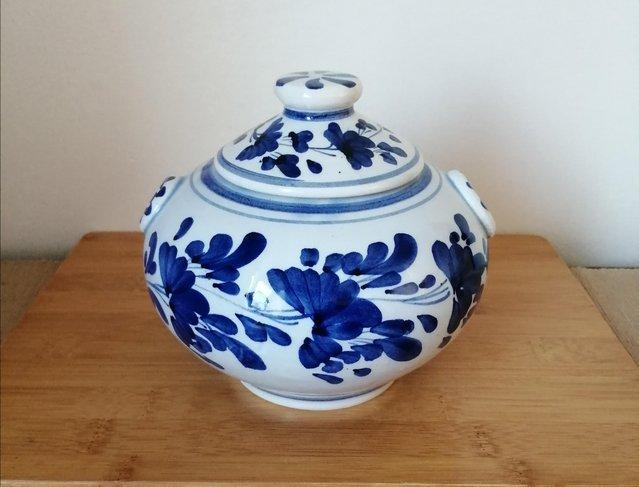 Preview of the first image of Hand painted blue and white lidded pot.