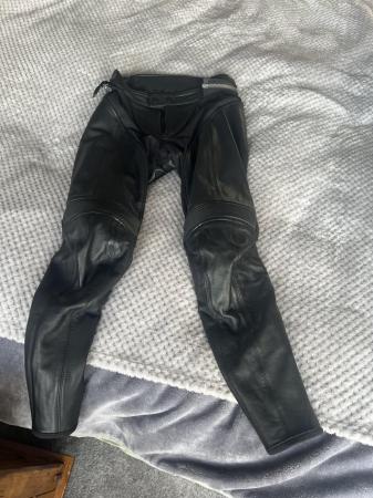 Image 1 of Black leather Rev’it motorcycle trousers