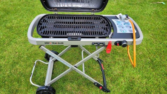 Preview of the first image of WEBER TRAVELLER FOLDING BBQ AS NEW.