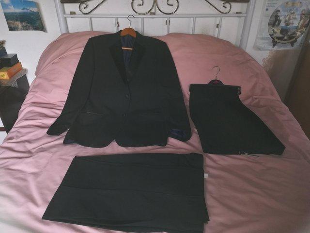 Preview of the first image of mens brand new dinner suit quality & two pairs trousers.